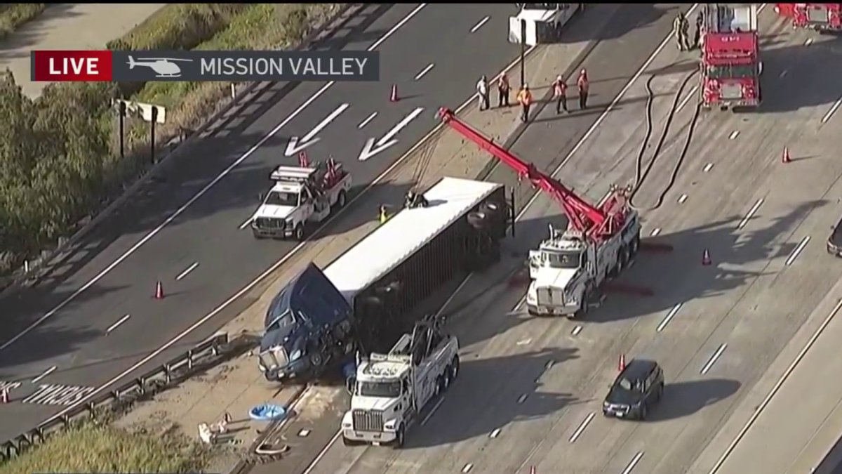 Toppled big rig stalls traffic on I-15 south near Friars Road in San ...