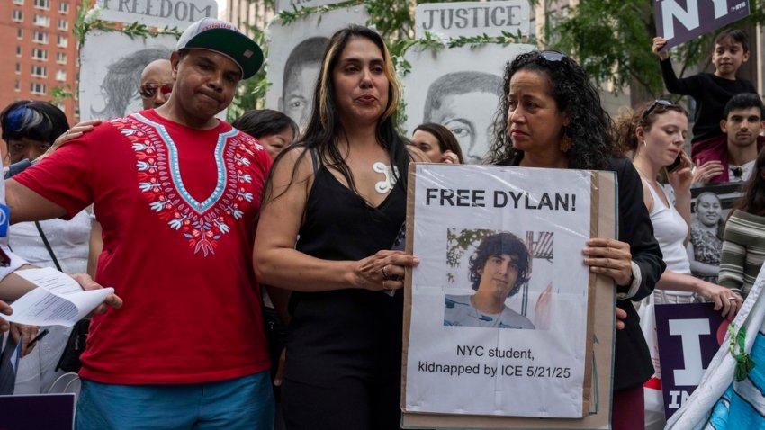 Raiza, center, mother of Dylan Lopez Contreras, first public high school student detained by federal agents, attends a press conference outside the Jacob K. Javits federal building, Thursday, July 17, 2025, in New York. (AP Photo/Yuki Iwamura)