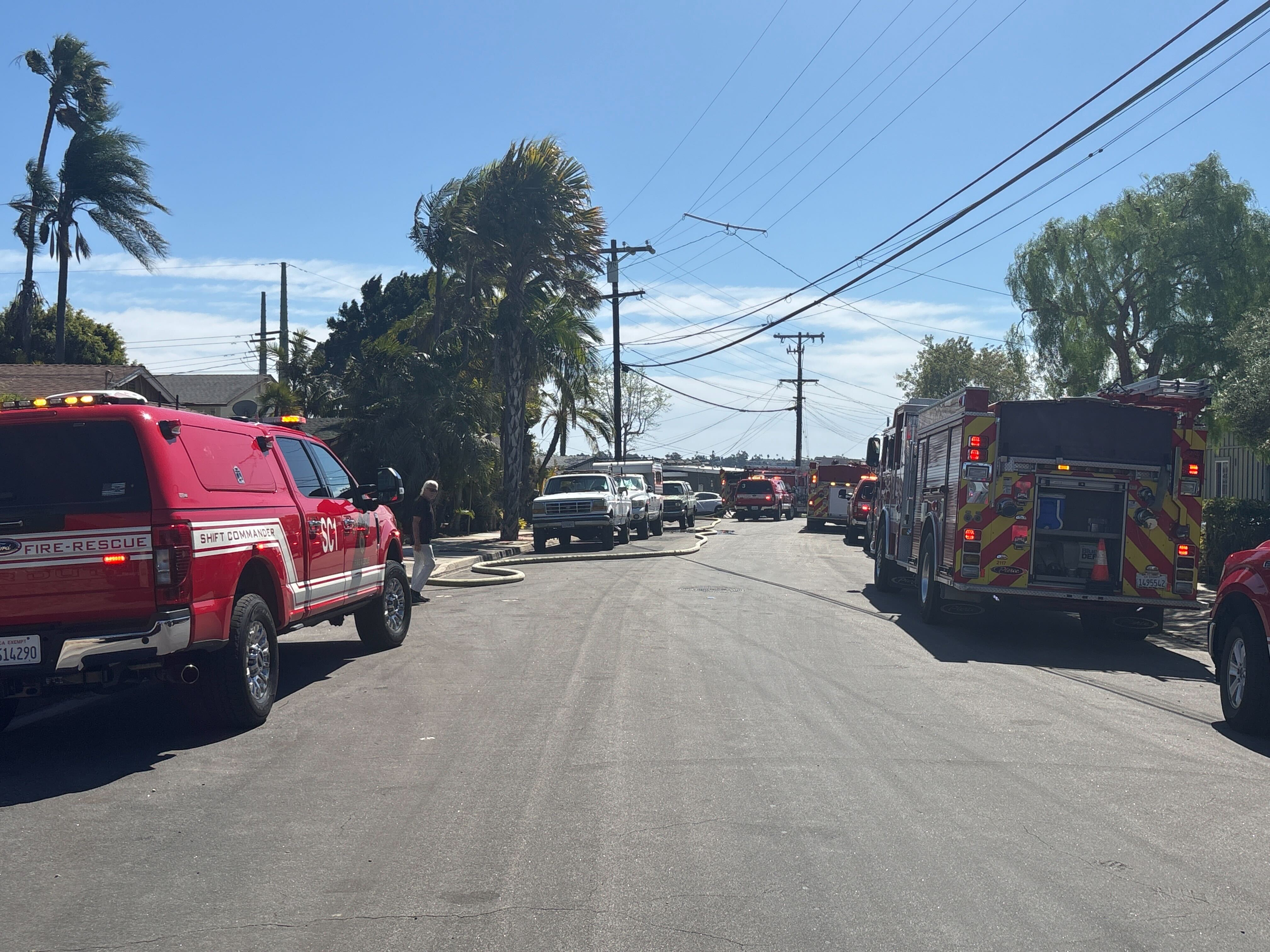 Firefighters stop brush fire that burned close to homes near Mission ...