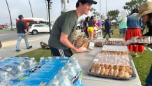 Asher Swazey, 16, is a sophomore at Canyon Crest Academy. He considers himself a student activist, who supported other students, Saturday, serving them food and water, March 28, 2026. 