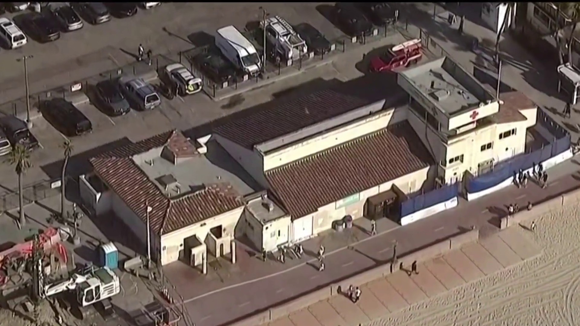 Temporary Mission Beach Lifeguard tower being built; boardwalk traffic detoured onto beach