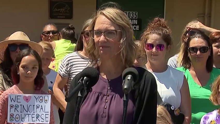 Greta Bouterse at a press conference, June 12, 2026, announcing a lawsuit against her previous workplace.