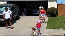 David and Kayla Rykbos spend time together, Saturday, following two seperate close calls with wildfire  in the past week, Oceanside, Calif., June 13, 2026.