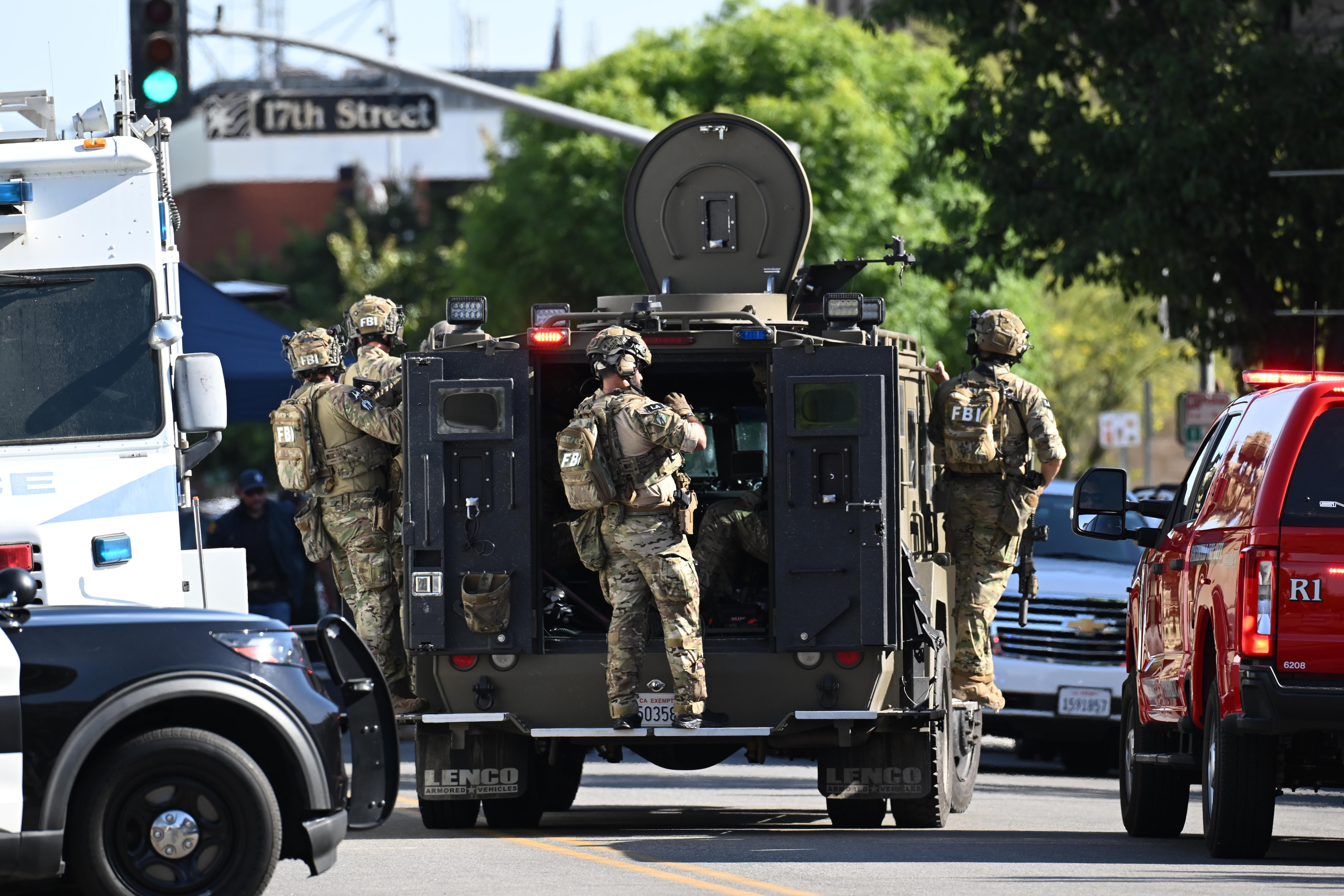 Suspect who took 10 people hostage in California standoff has been shot and killed