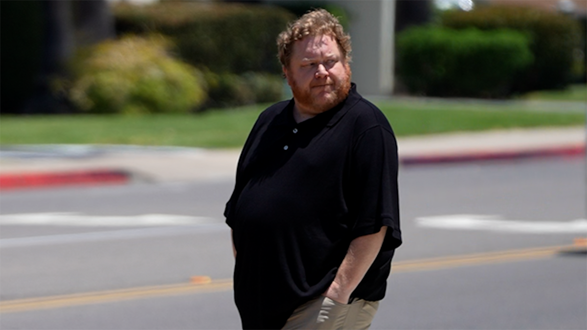 Frank Peavey, an online 'spellcaster' who goes by the name 'Tess Joy' walks out of the Chula Vista courthouse on June 10, 2026 after testifying in Larry Millete's murder trial.