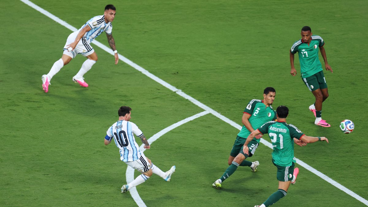 Argentina's Lionel Messi starts World Cup with two goals vs. Algeria