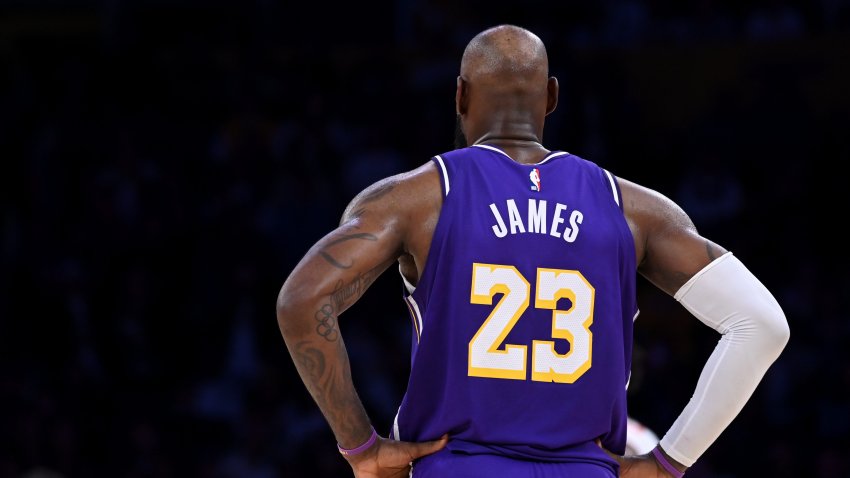 LeBron James, then #23 of the Los Angeles Lakers looks on.