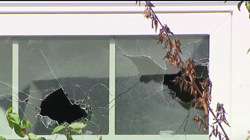 A smashed window a day after a standoff ended in a San Diego police shooting that left a man dead in Point Loma.