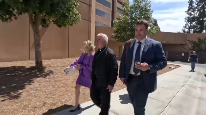 Bishop Emmanuel Shaleta, 69, walks outside court after his preliminary hearing on Aug. 27, 2026. (NBC 7 San Diego)