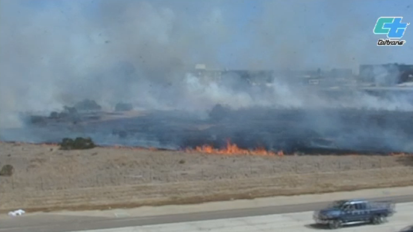 A brush fire along SR-163 and SR-52 in Miramar.