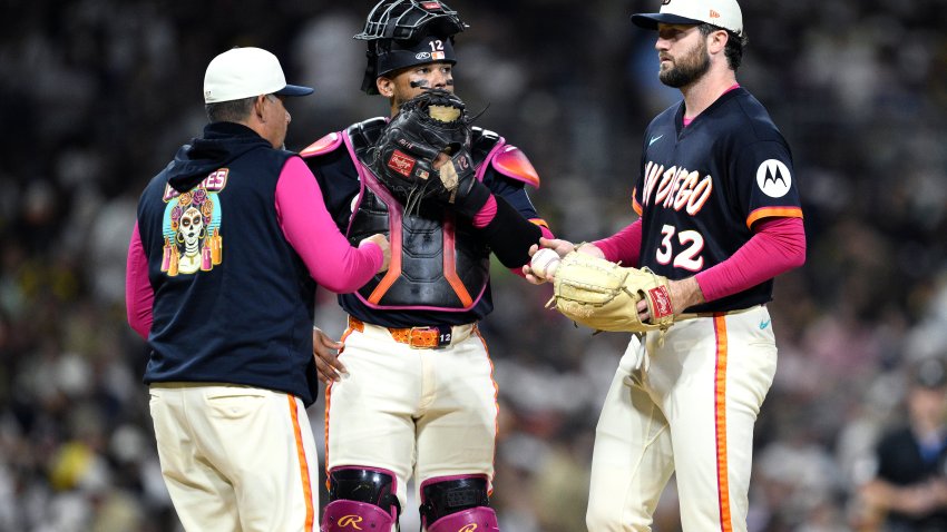 SAN DIEGO, CALIFORNIA – SEPTEMBER 25: Pitching coach Ruben Niebla #57 of the San Diego Padres speaks with Casey Mize #32 during the third inning against the Arizona Diamondbacks at Petco Park on September 25, 2026 in San Diego, California. (Photo by Orlando Ramirez/Getty Images)
