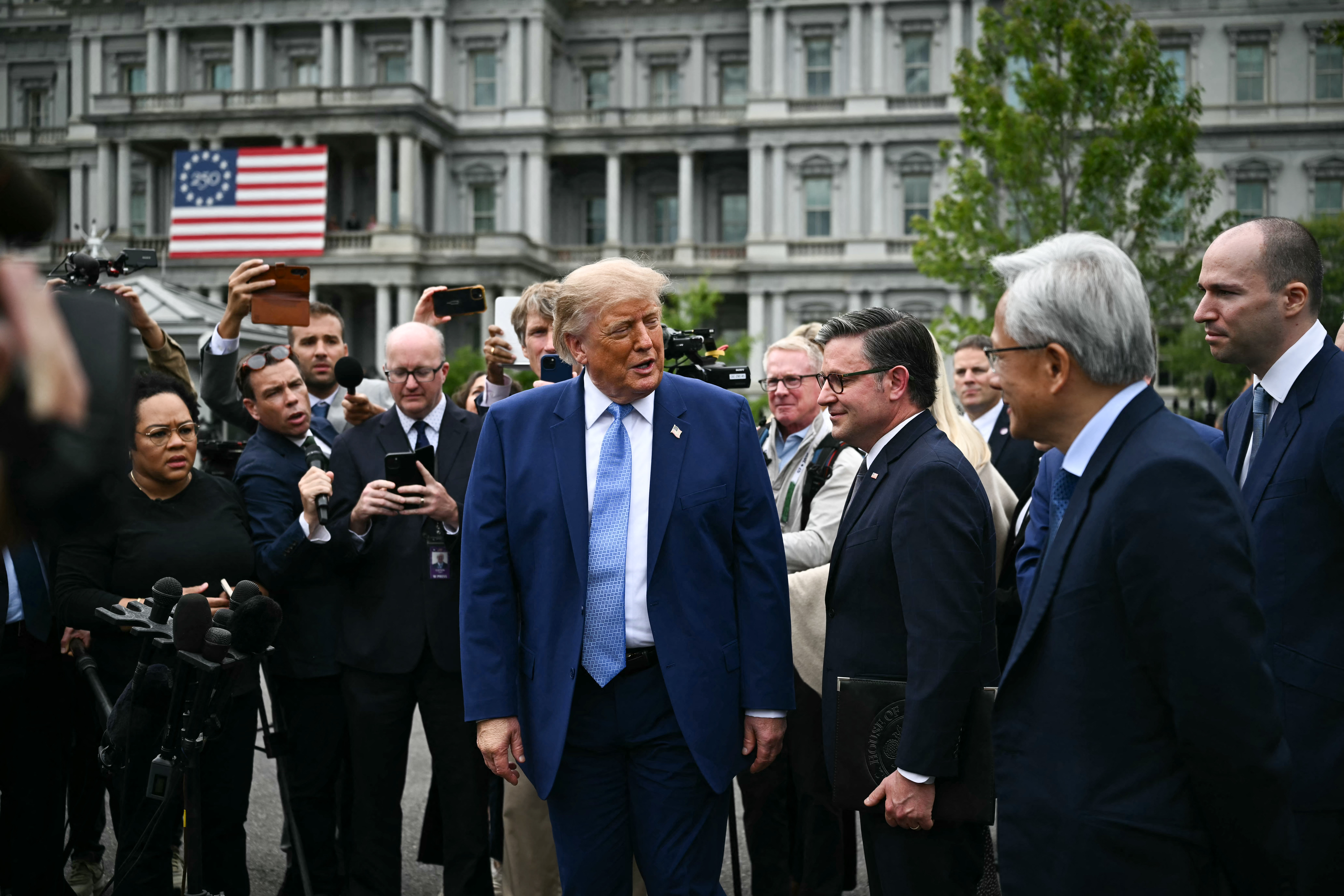 President Donald Trump arrives to speak to the press after a meeting with technology executives about artificial intelligence at the White House in Washington, DC, on September 29, 2026.