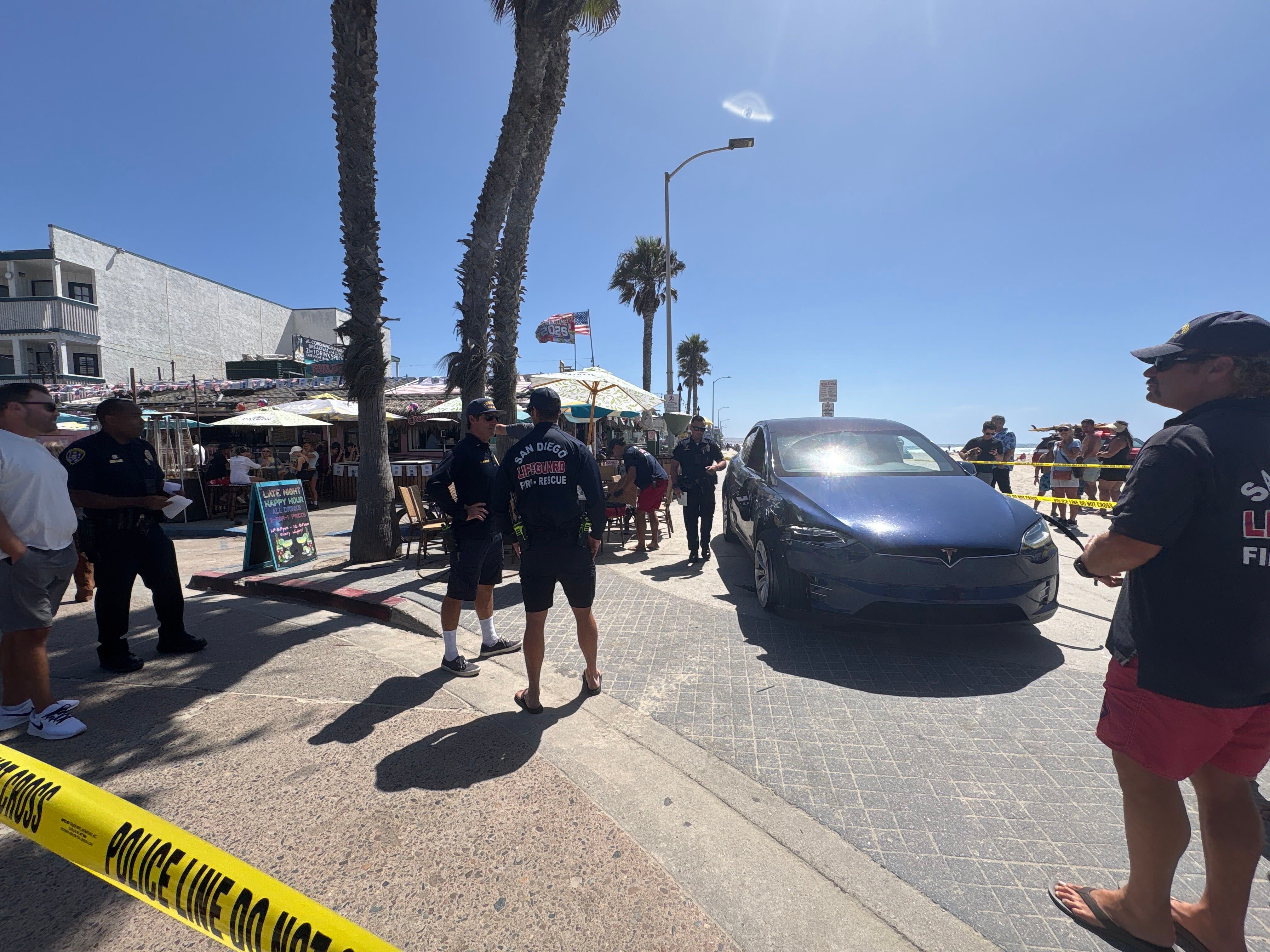 Tesla Strikes Pedestrian on Pacific Beach Boardwalk, Driver Arrested