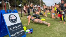 Tidelands Park served as a pit stop for athletes to take a bring from their swim.  They did a workout honoring fallen military members,  Coronado, Calif, September 19, 2026.