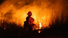 A firefighter monitors the spread of the Auto Fire in Oxnard, Los Angeles, on Jan. 13, 2025.