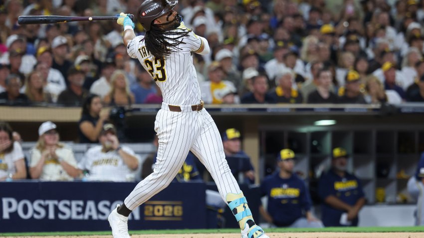 SAN DIEGO, CALIFORNIA – OCTOBER 07:  Fernando Tatis Jr. #23 of the San Diego Padres hits a solo home run against the Milwaukee Brewers during the third inning in game four of the National League Division Series at Petco Park on October 07, 2026 in San Diego, California.  (Photo by Sean M. Haffey/Getty Images)