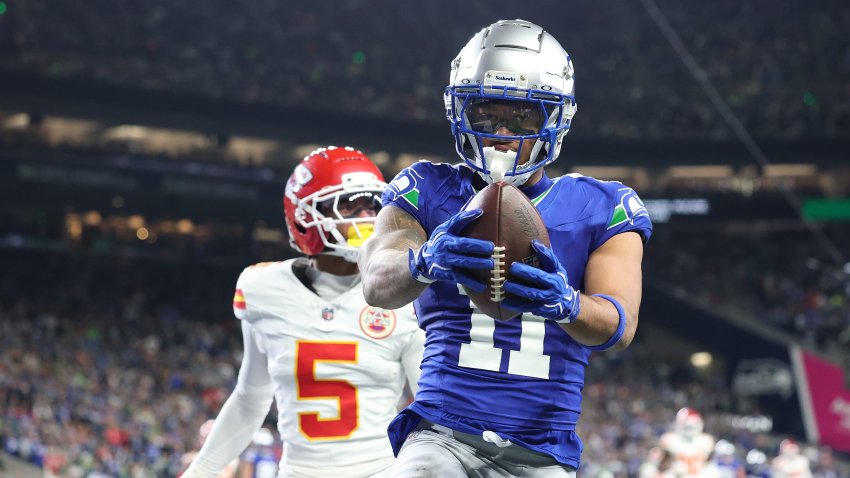 Jaxon Smith-Njigba #11 of the Seattle Seahawks catches a pass.