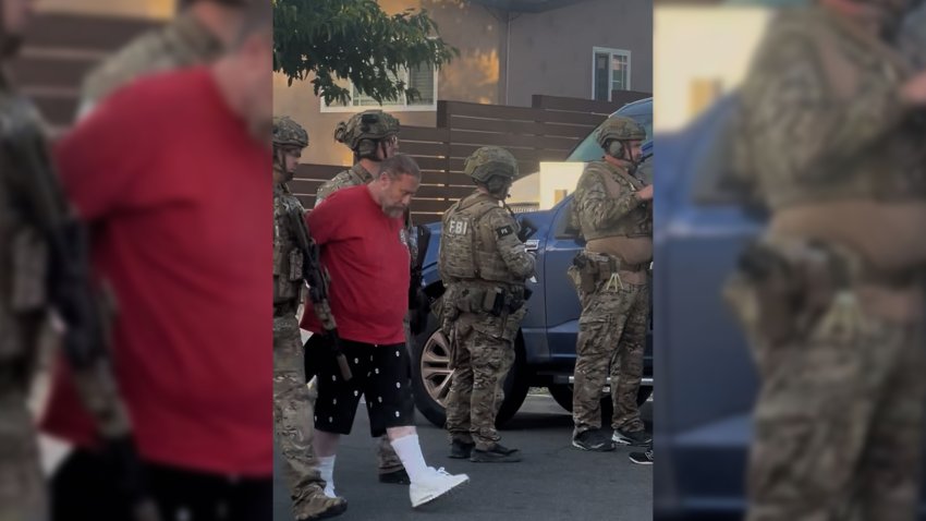 A man walks with FBI in Lemon Grove on October 28, 2026.
